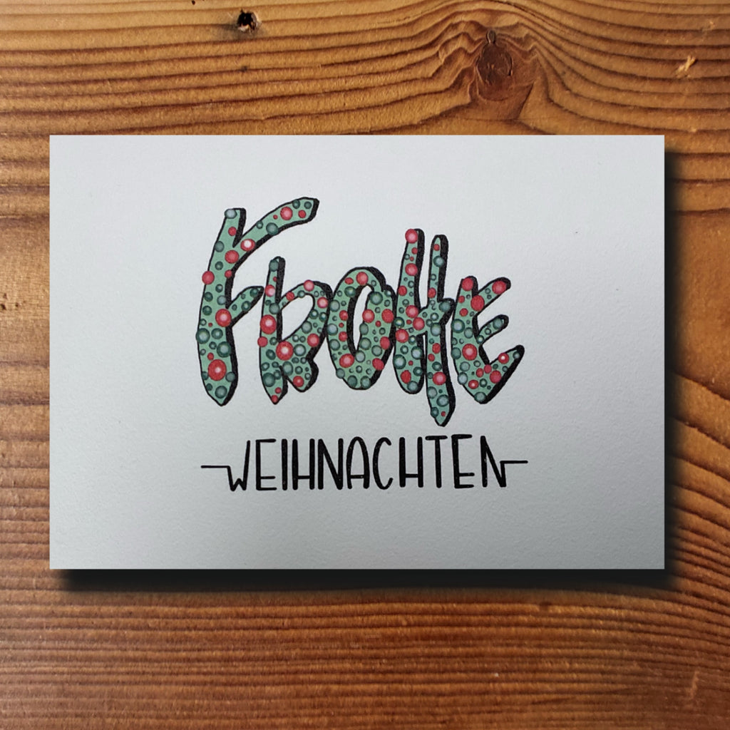 Weihnachtskarte Frohe Weihnachten – Handlettering mit Muster in Grün und Rot
