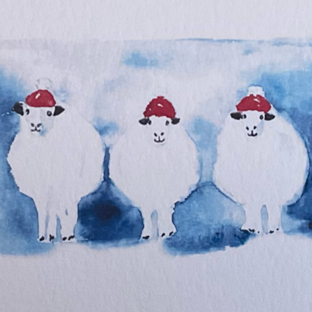 Detailaufnahme Weihnachtskarte – Aquarell-Schafe mit roten Weihnachtsmützen, handgemalt