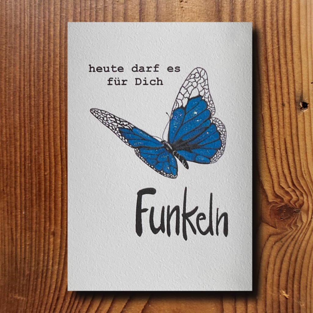 Motivationskarte mit blauem Schmetterling und Schriftzug heute darf es für Dich Funkeln, Glitter-Veredelung, A6-Format, KicomiArt
